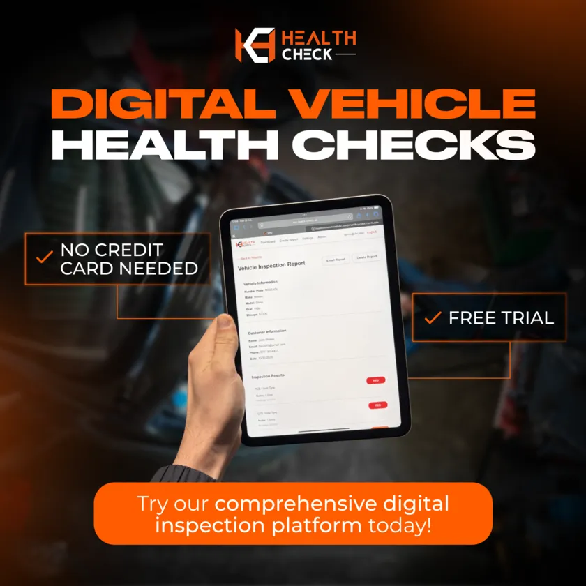 Mechanic holding tablet